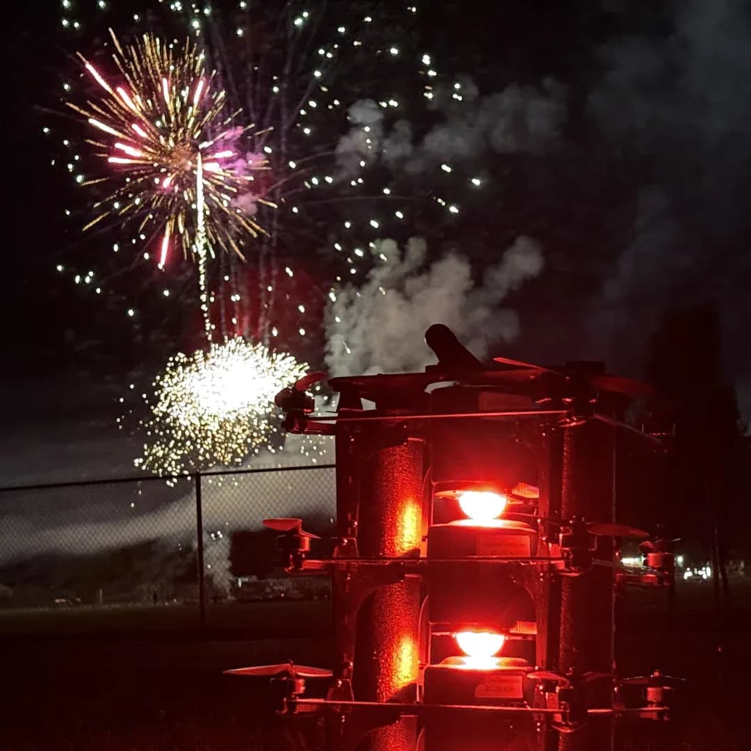 Drone light show display at night